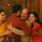 Indian family joyfully hugging at the airport during festive season reunion after arriving home with an eVisa to India.